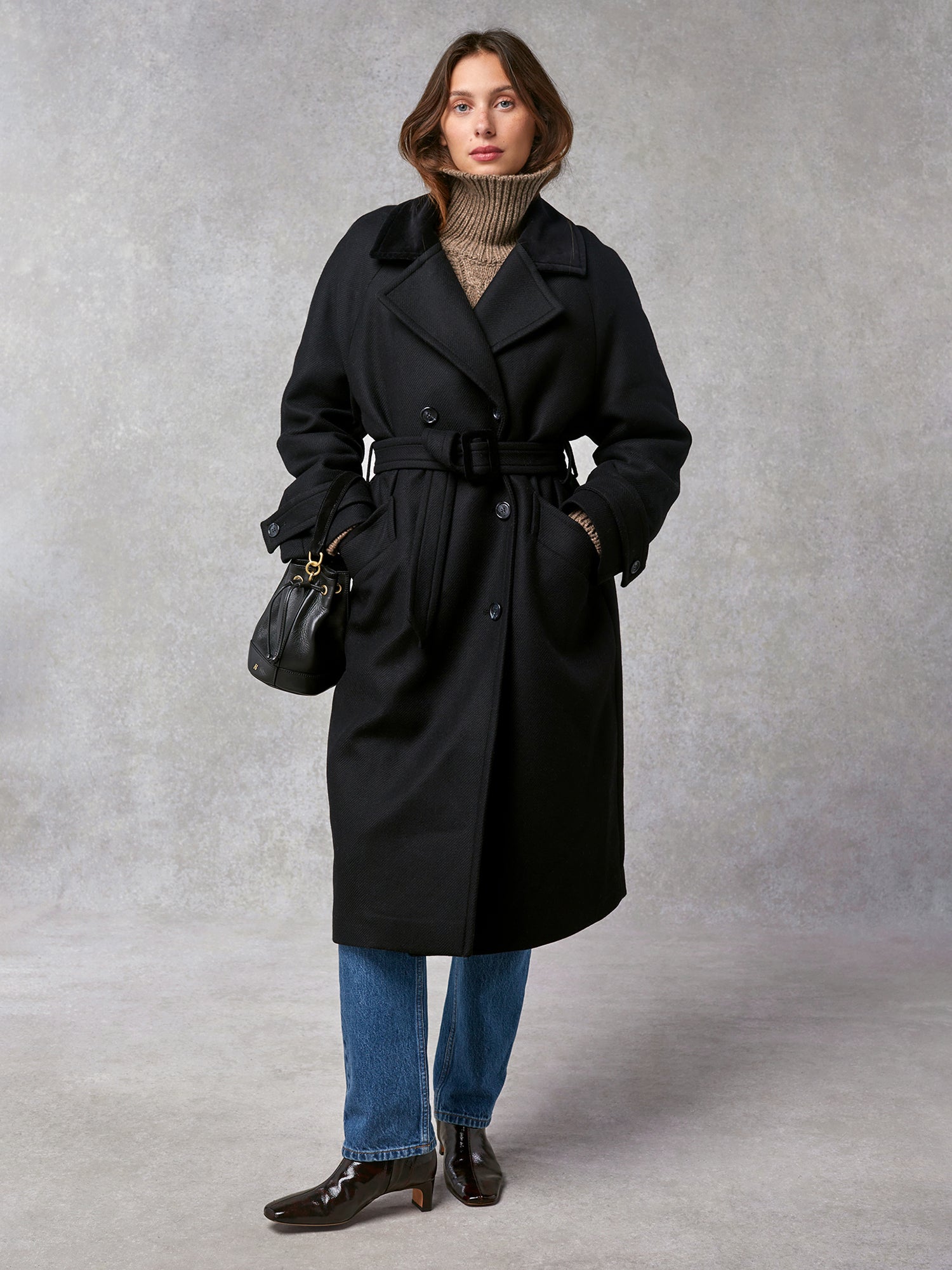 Oversized double-breasted and belted black wool coat | Rouje